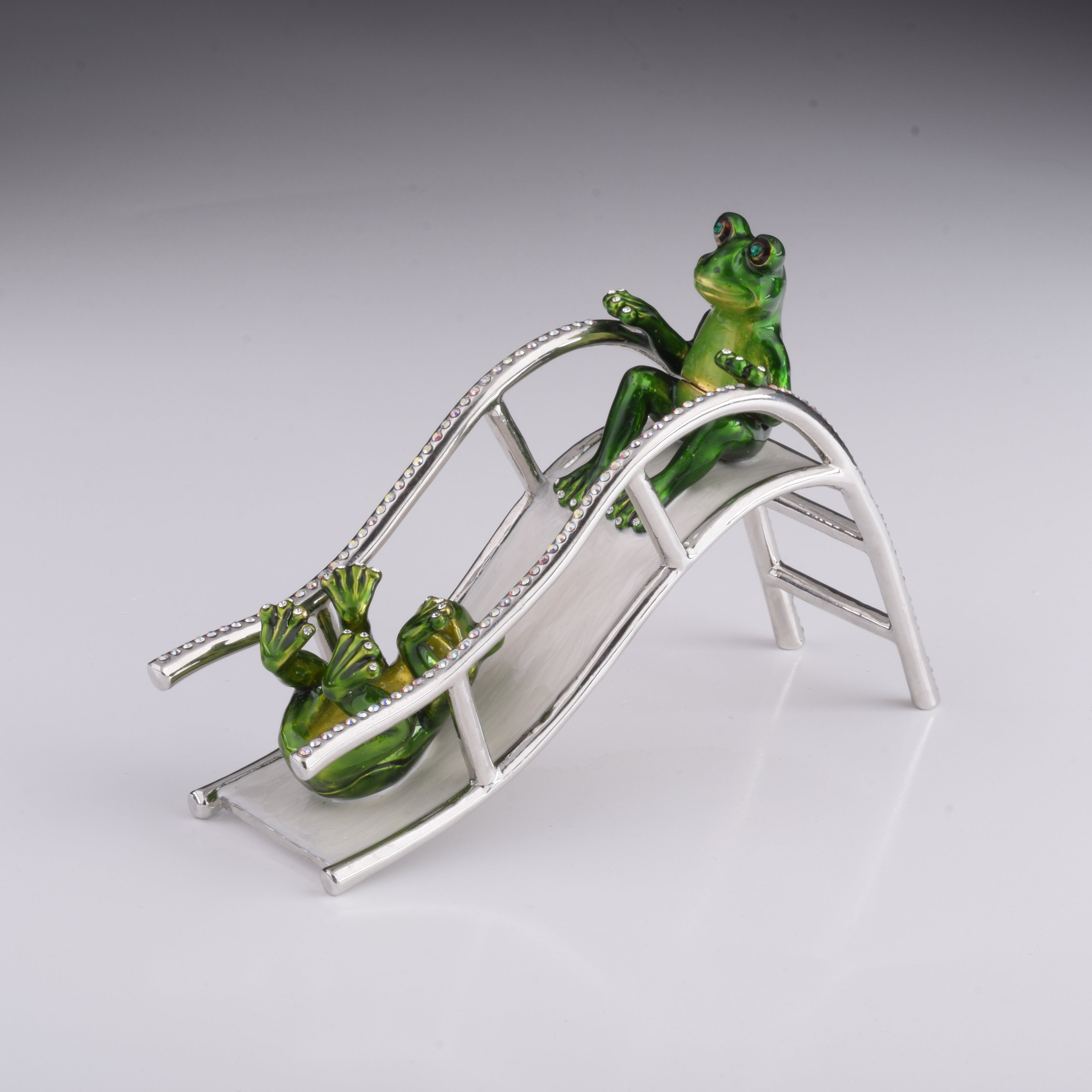 Two Frogs Riding Slide