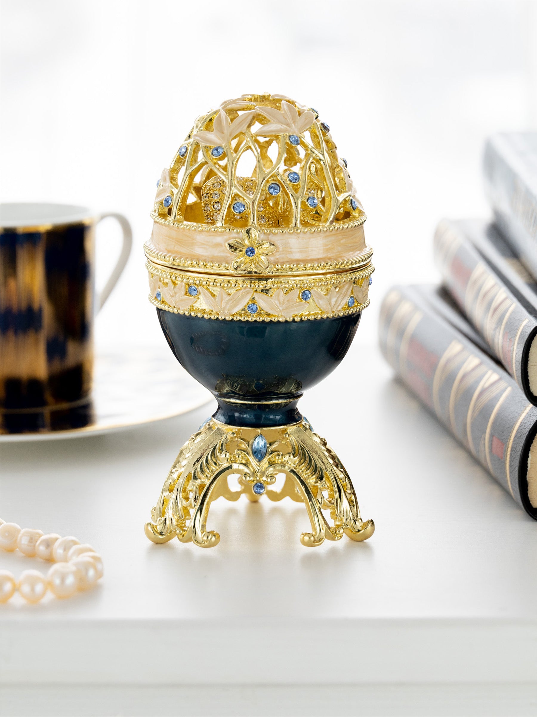 Golden Blue Faberge Egg with a Golden Elephant