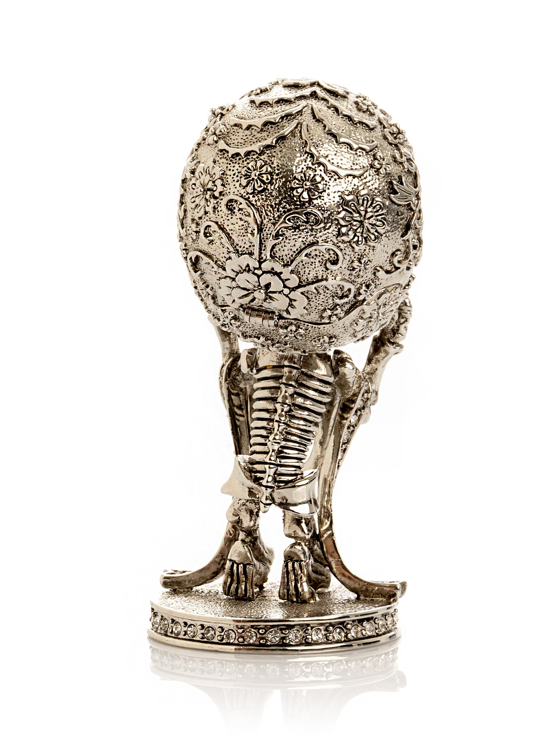 Silver Skeleton holding Skull