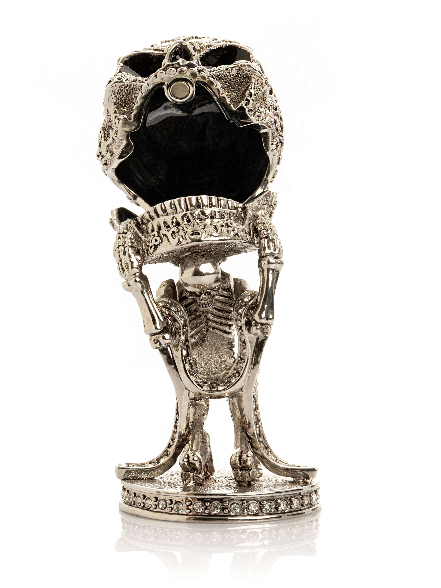 Silver Skeleton holding Skull