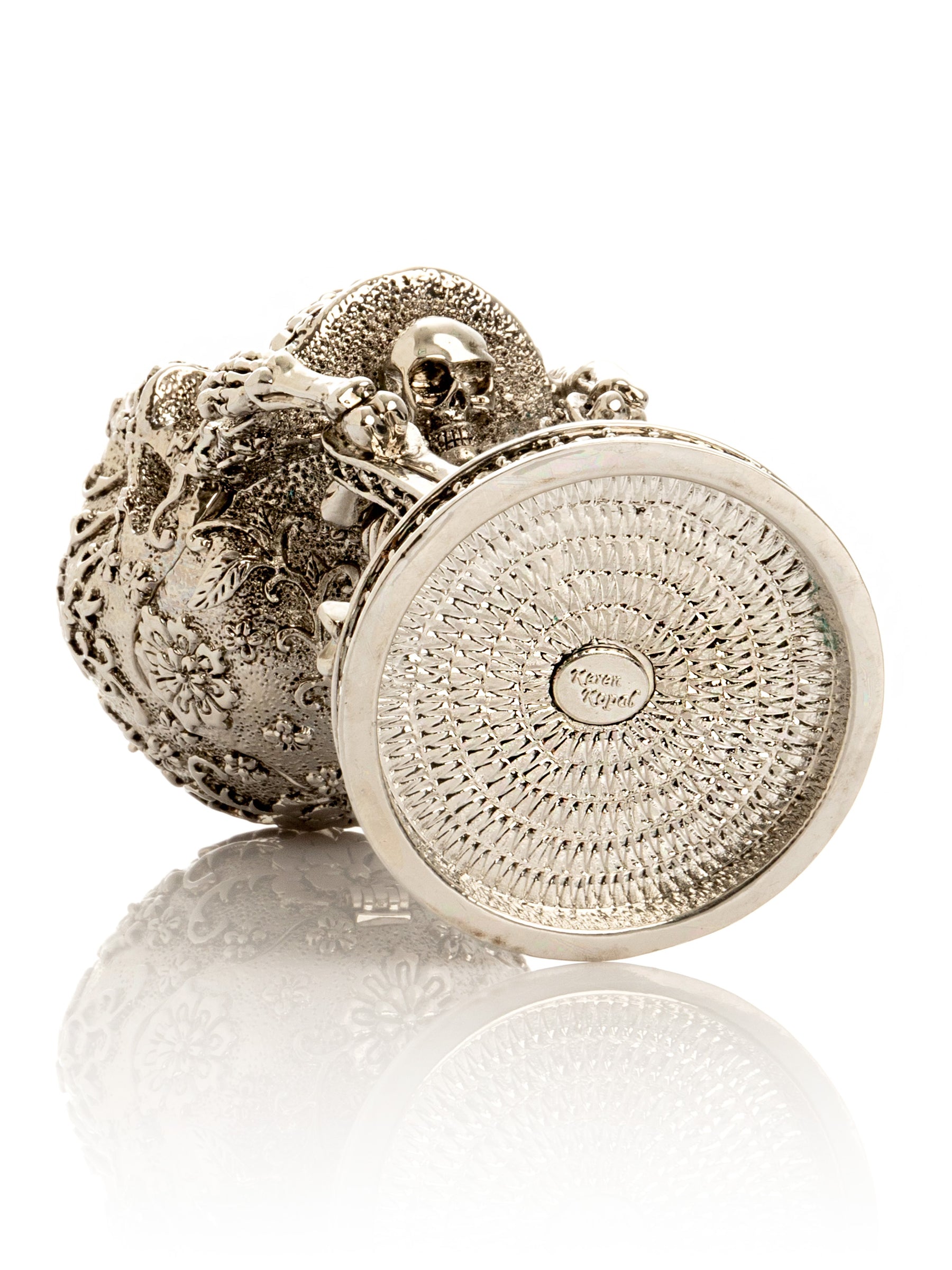 Silver Skeleton holding Skull