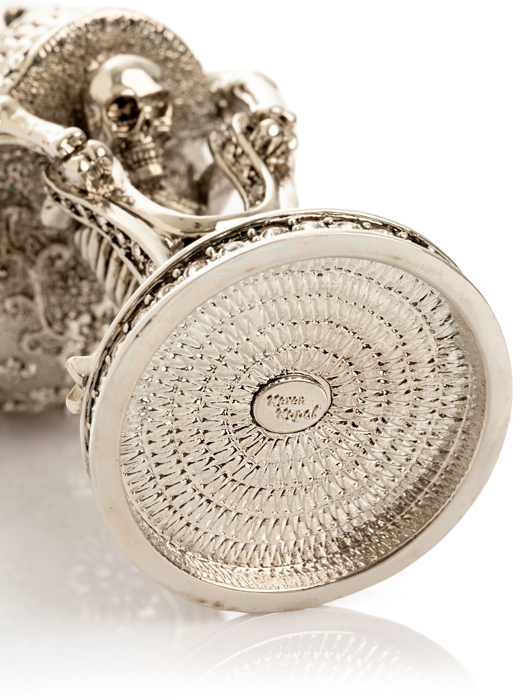 Silver Skeleton holding Skull