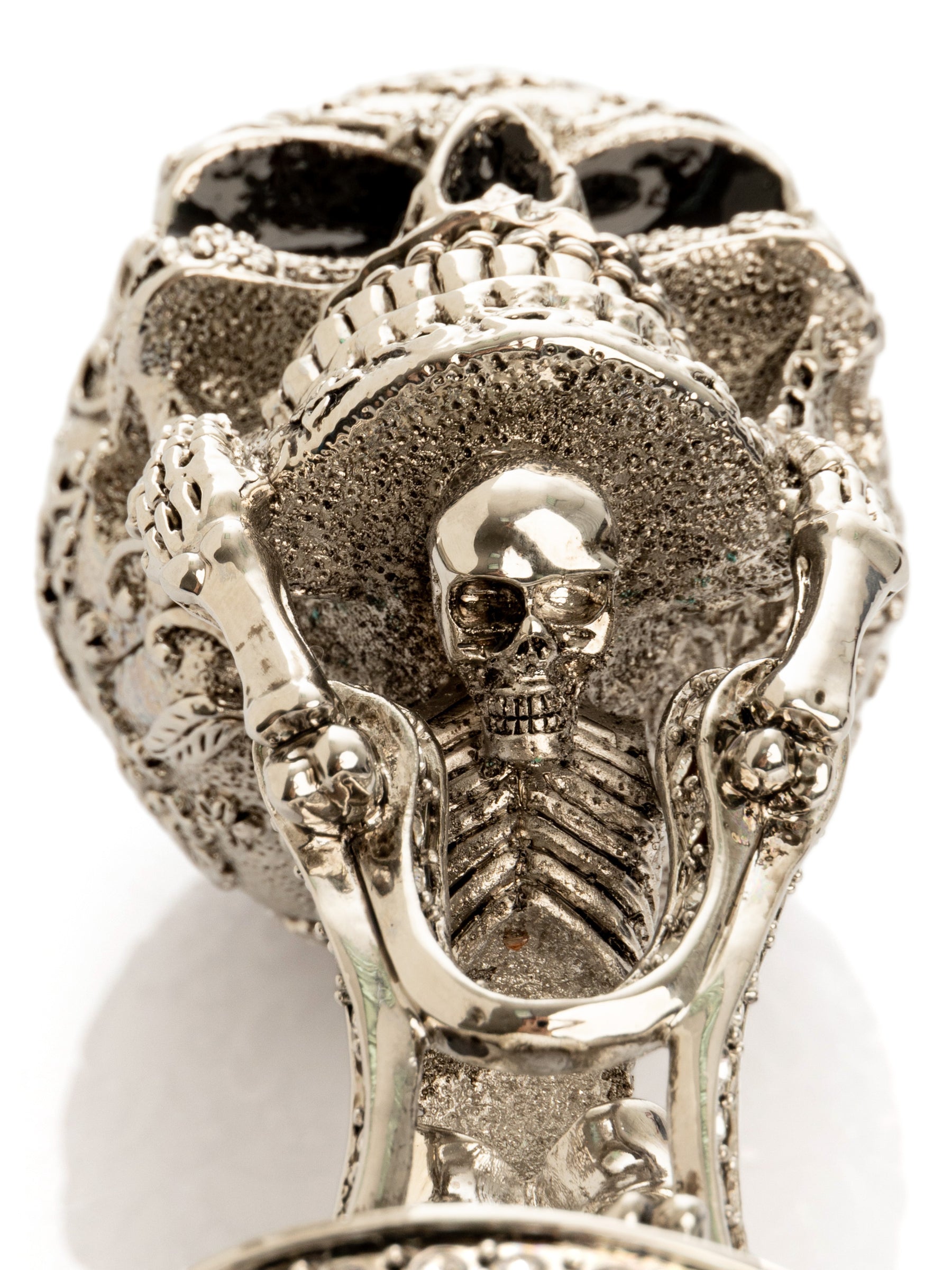 Silver Skeleton holding Skull