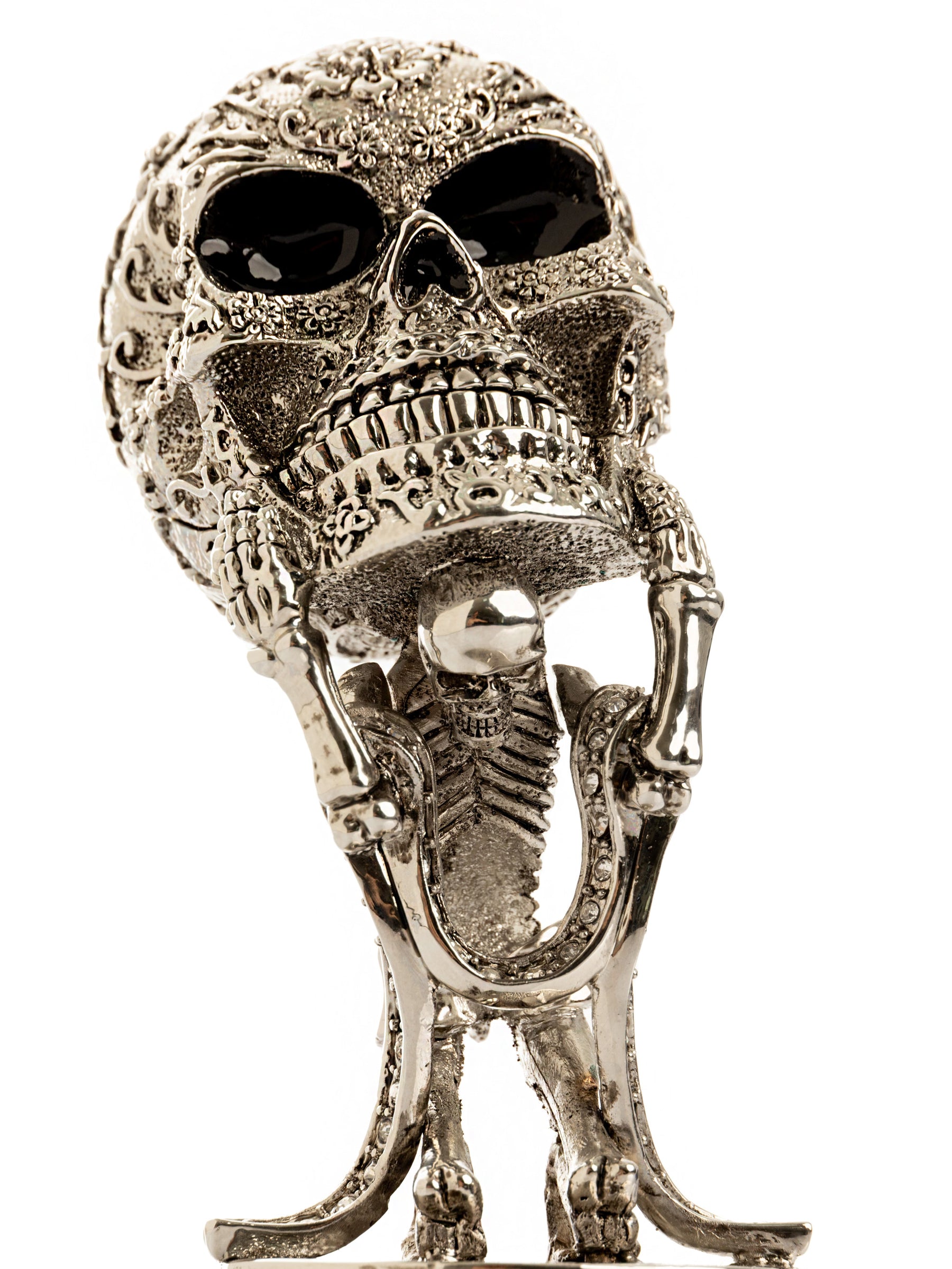 Silver Skeleton holding Skull