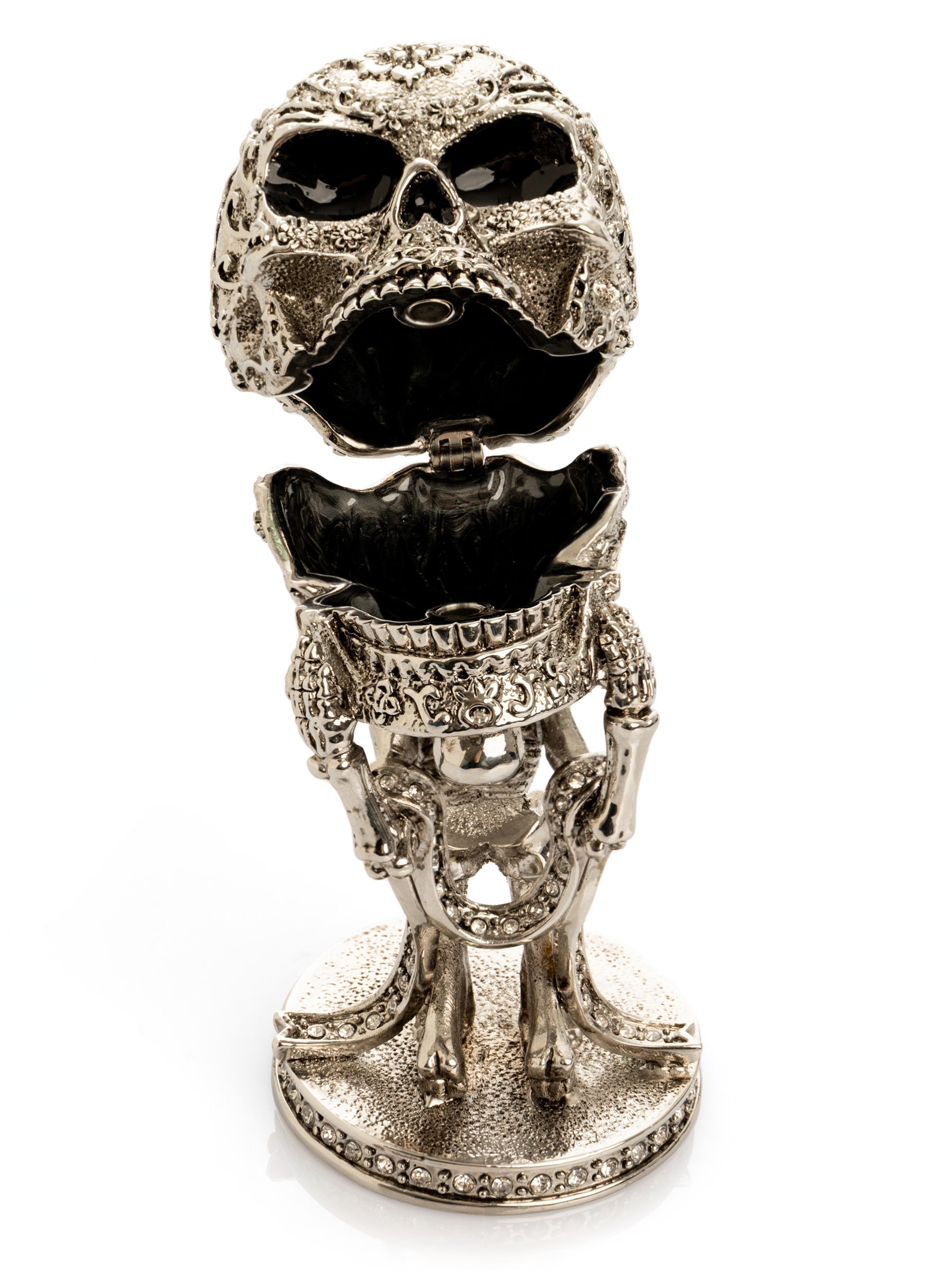 Silver Skeleton holding Skull