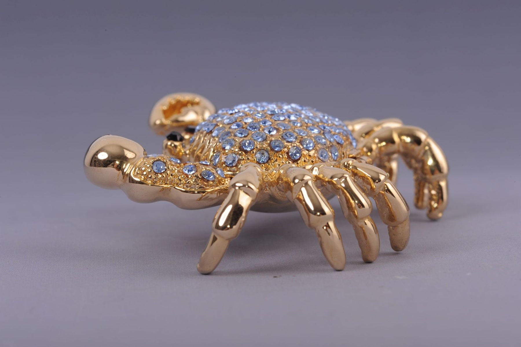 Golden Crab with blue stones