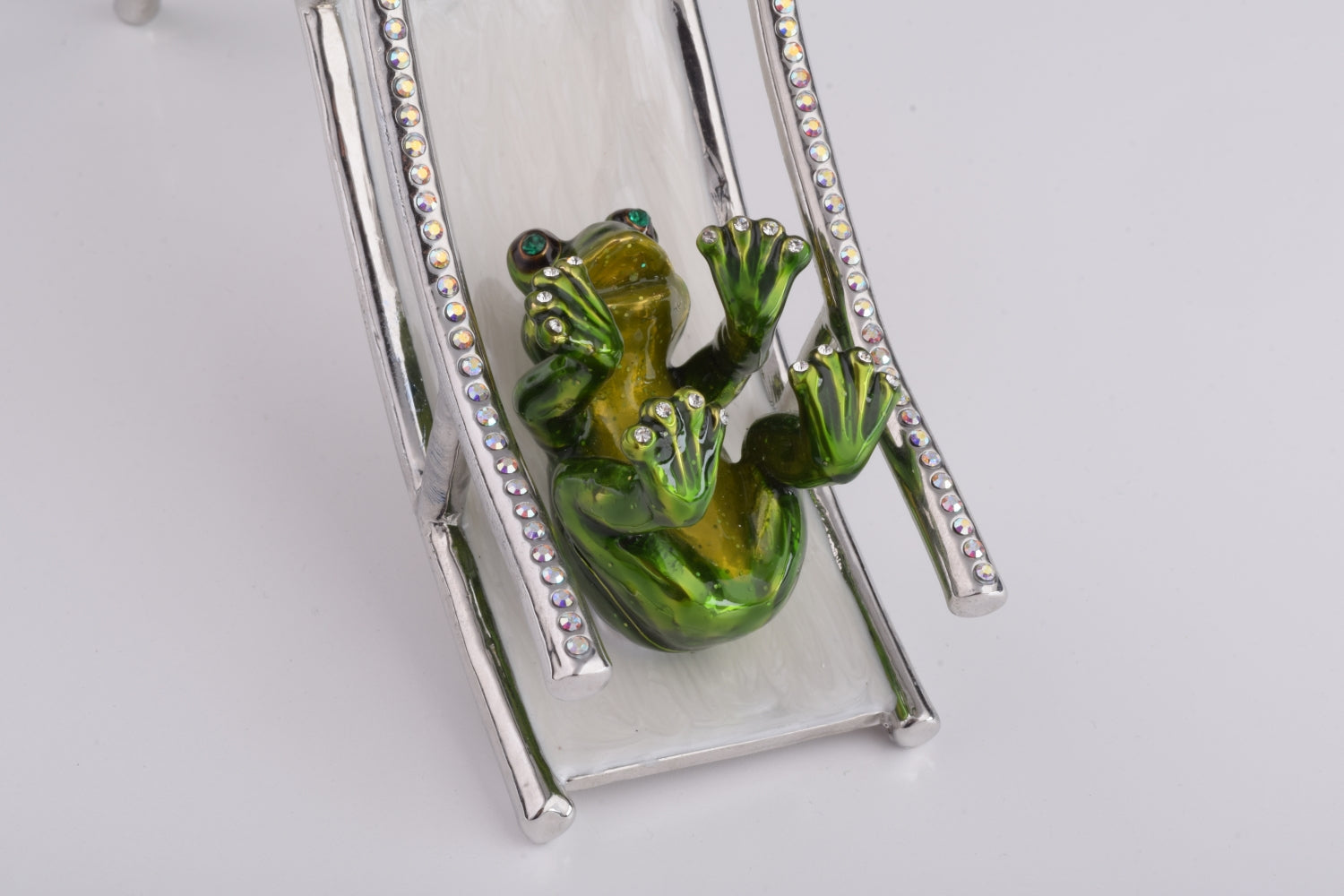 Two Frogs Riding Slide