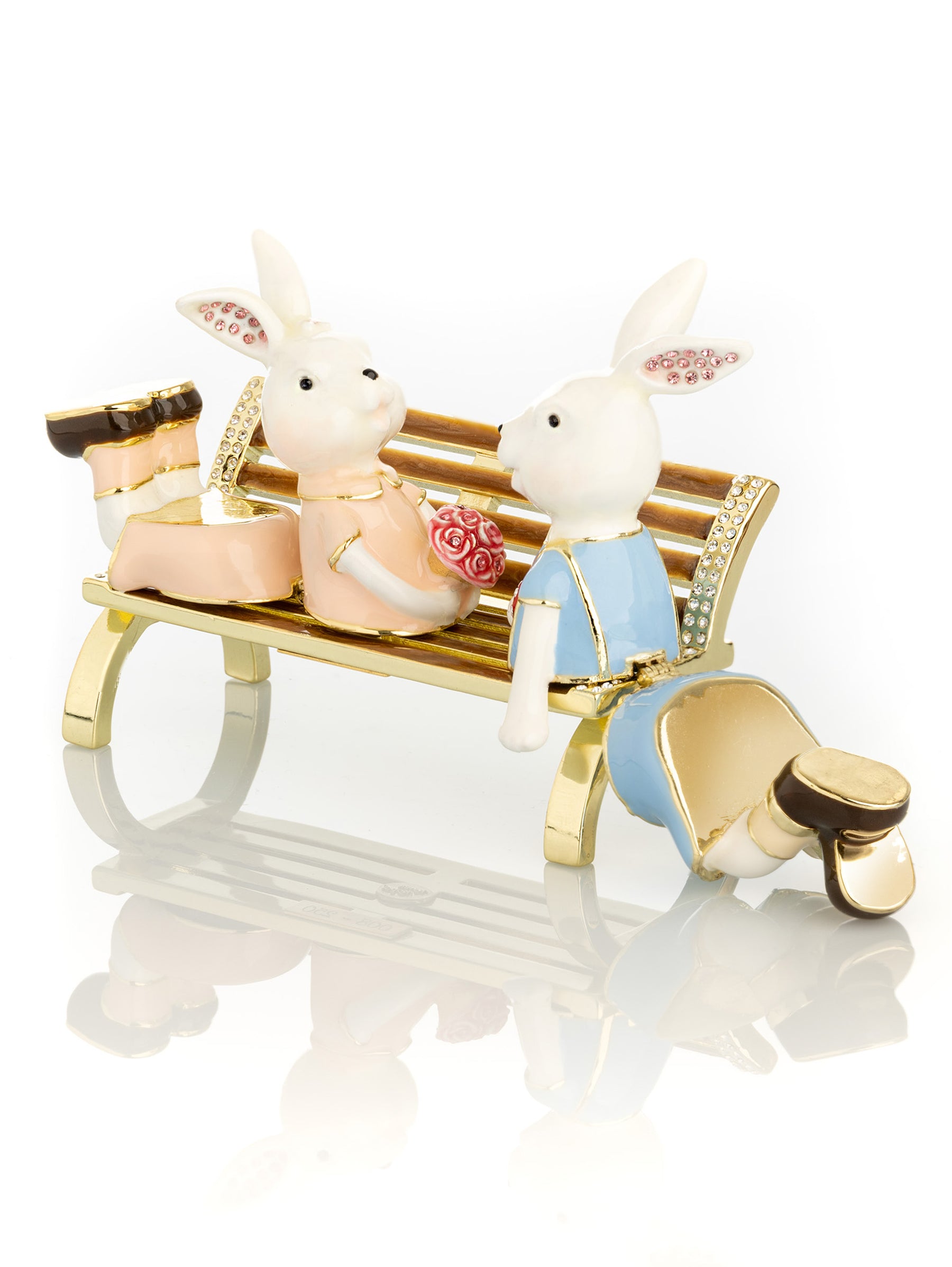 2 bunnies in love sitting on a bench, valentine flowers and chocolates