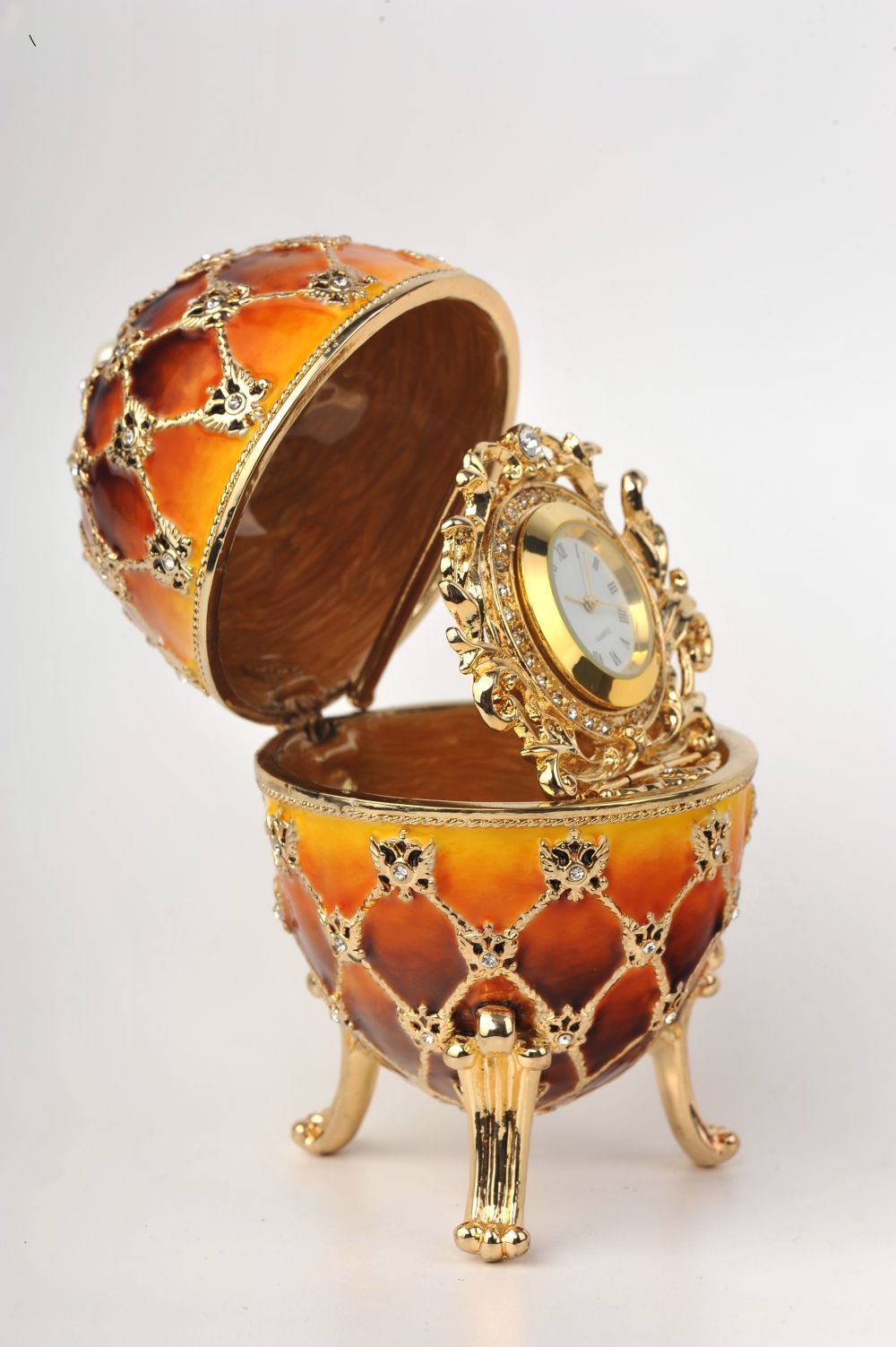 Orange and Yellow Faberge Egg with a Gold Clock