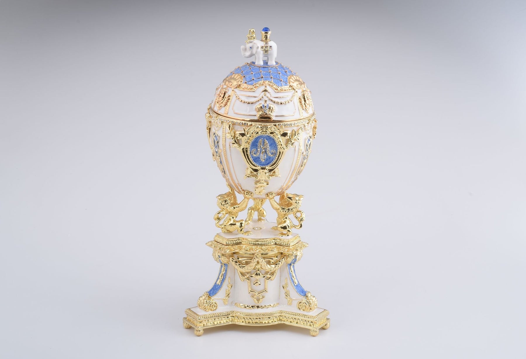 Keren Kopal White Faberge Egg with an Elephant on Top