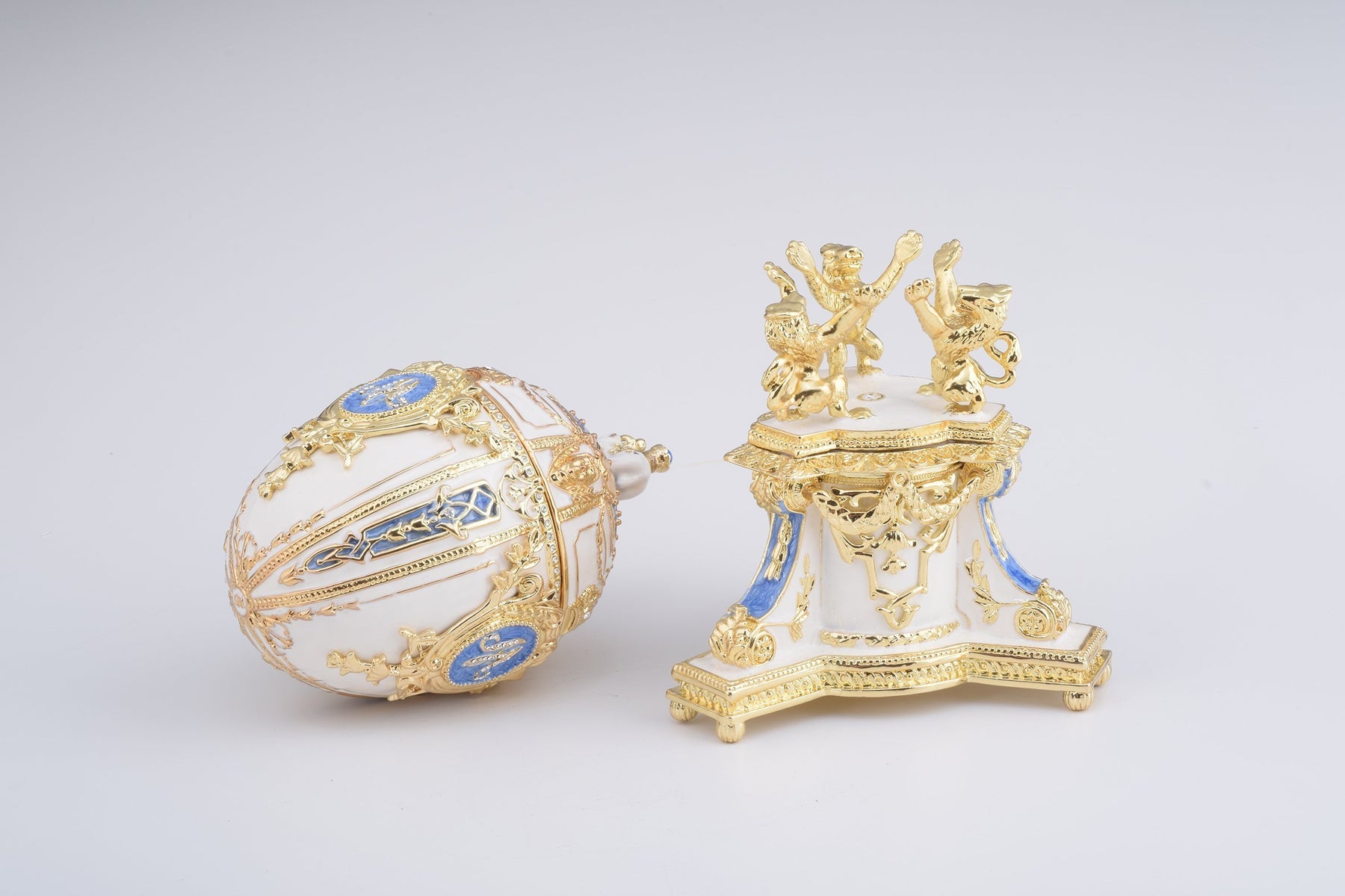 Keren Kopal White Faberge Egg with an Elephant on Top