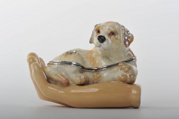 Keren Kopal Zodiac Dog Laying on Hand