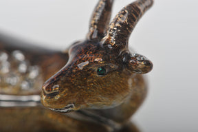 Zodiac Ram Laying on Hand