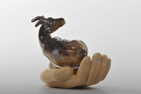 Zodiac Ram Laying on Hand