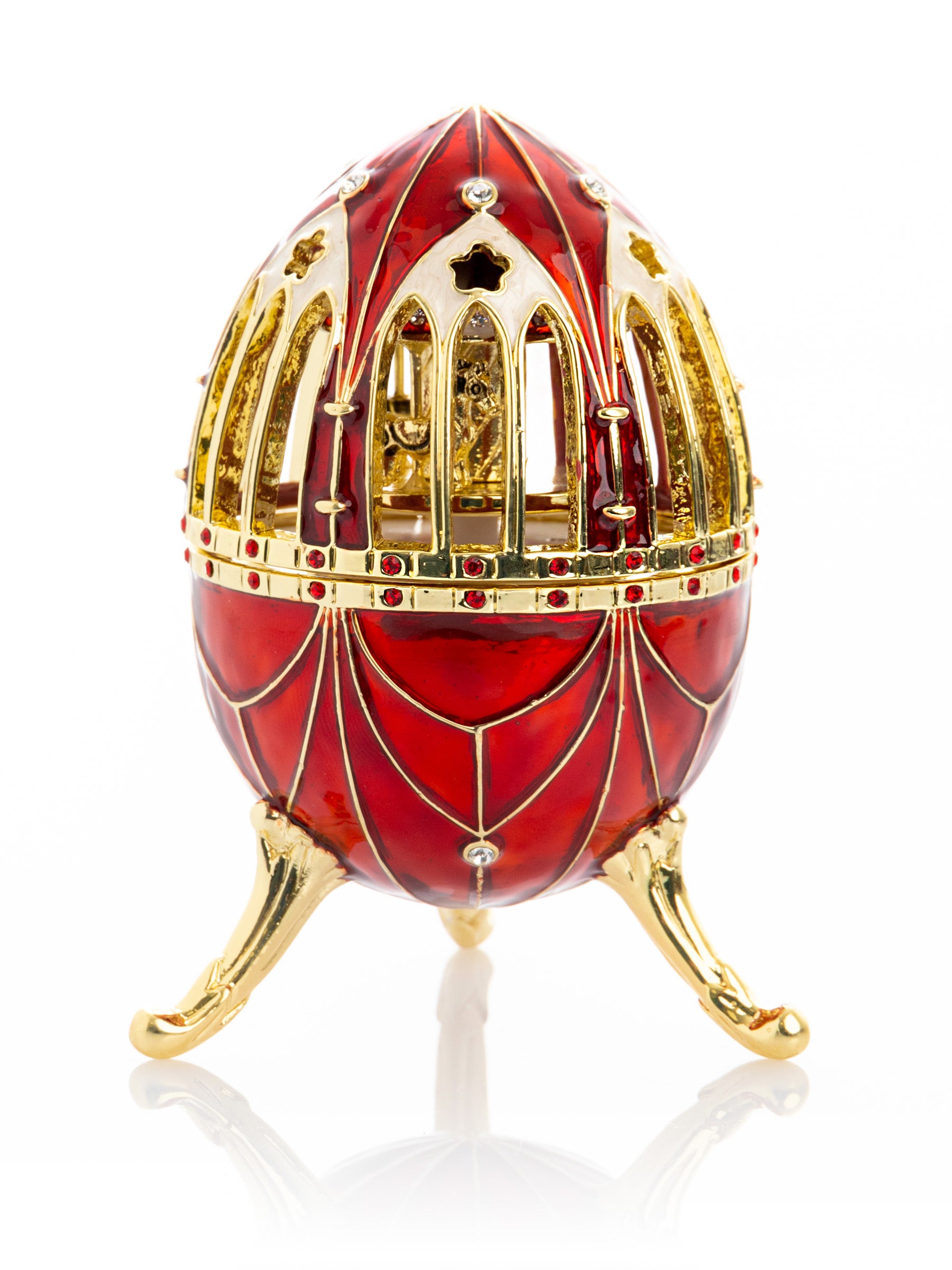Красное яйцо в стиле Фаберже с музыкальной каруселью внутри