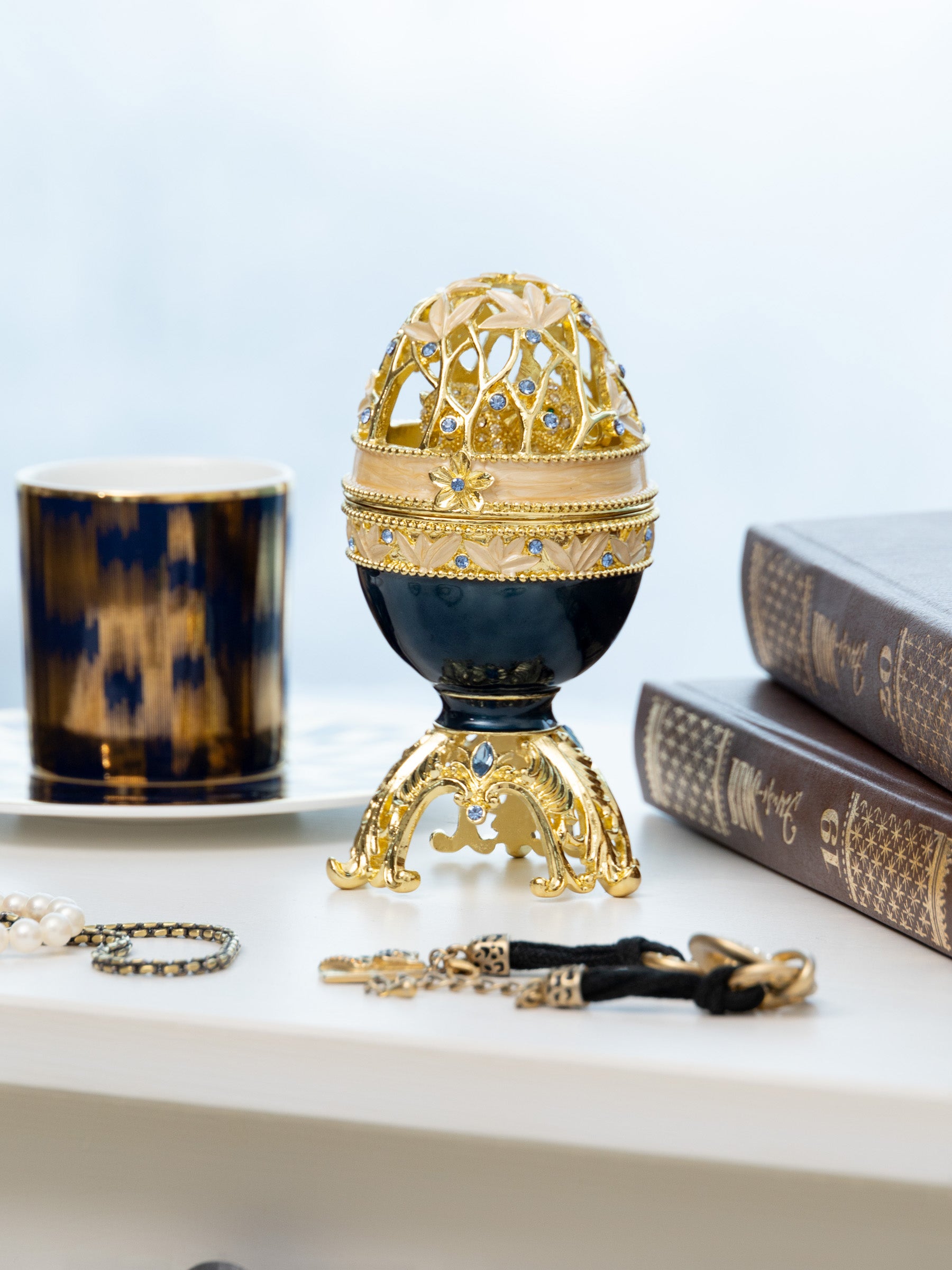 Golden Blue Faberge Egg with a Golden Elephant