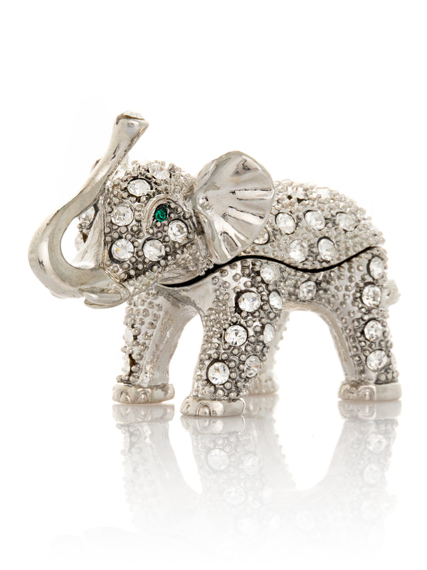 Éléphant argenté aux yeux verts