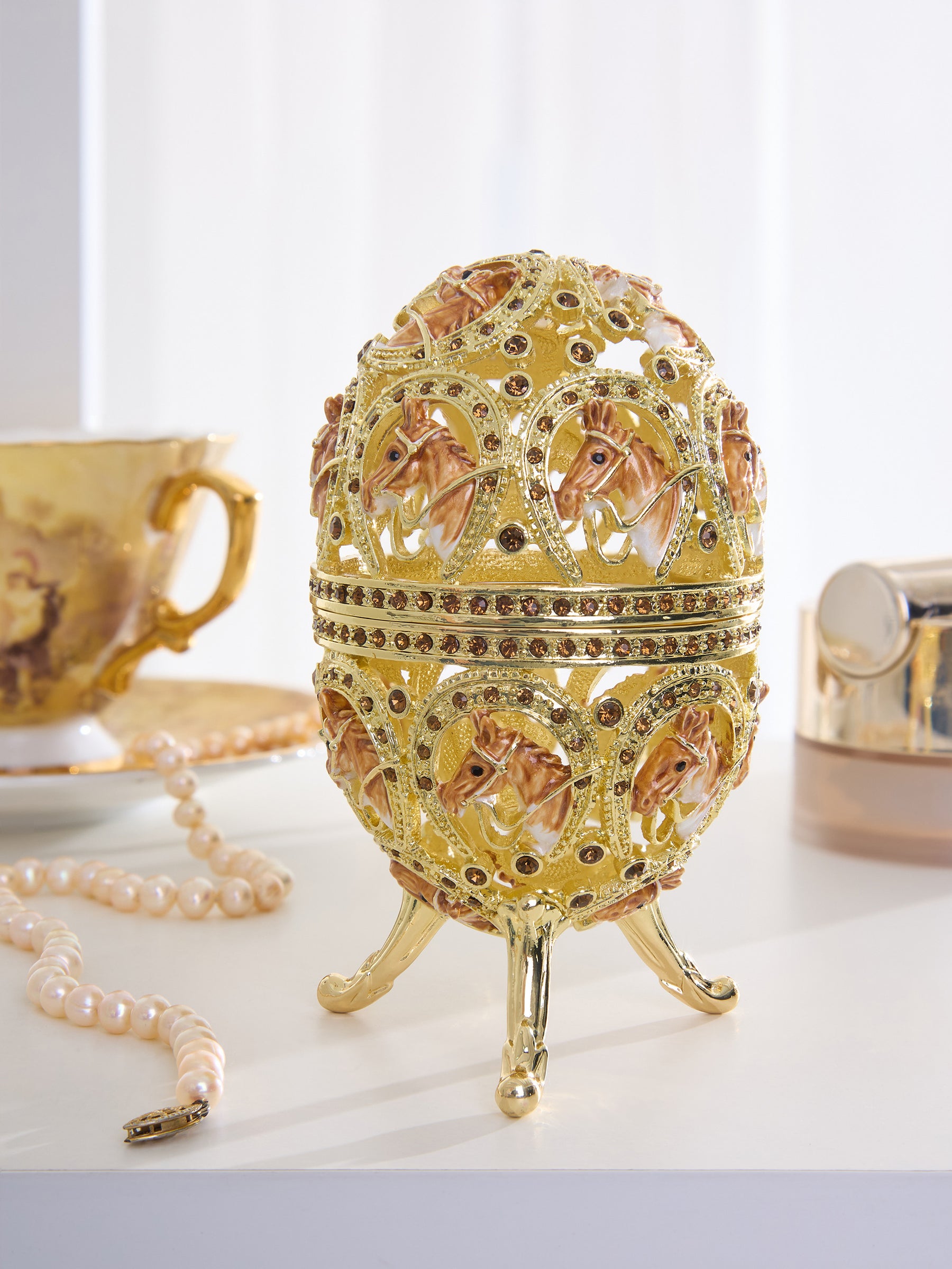 Golden Easter Egg decorated with Horses