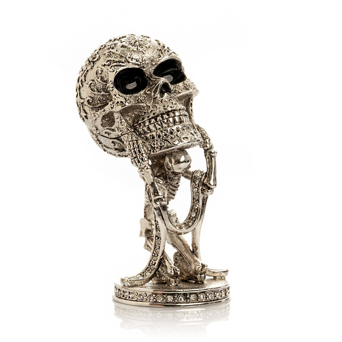 Silver Skeleton holding Skull