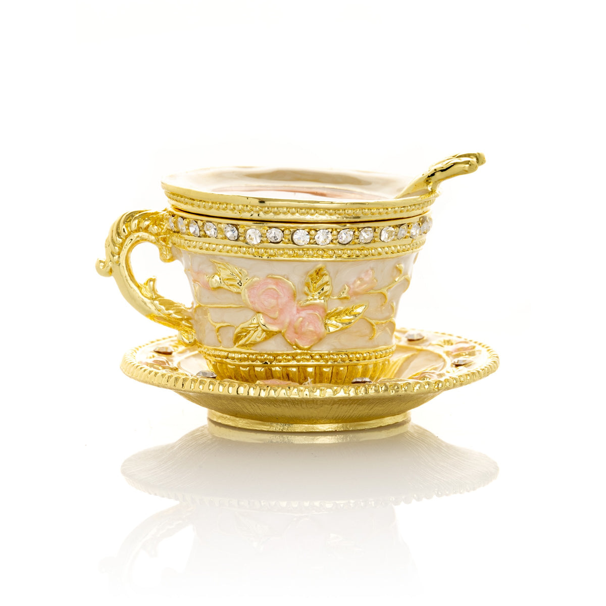 Goldene Teetasse mit rosa Rosen