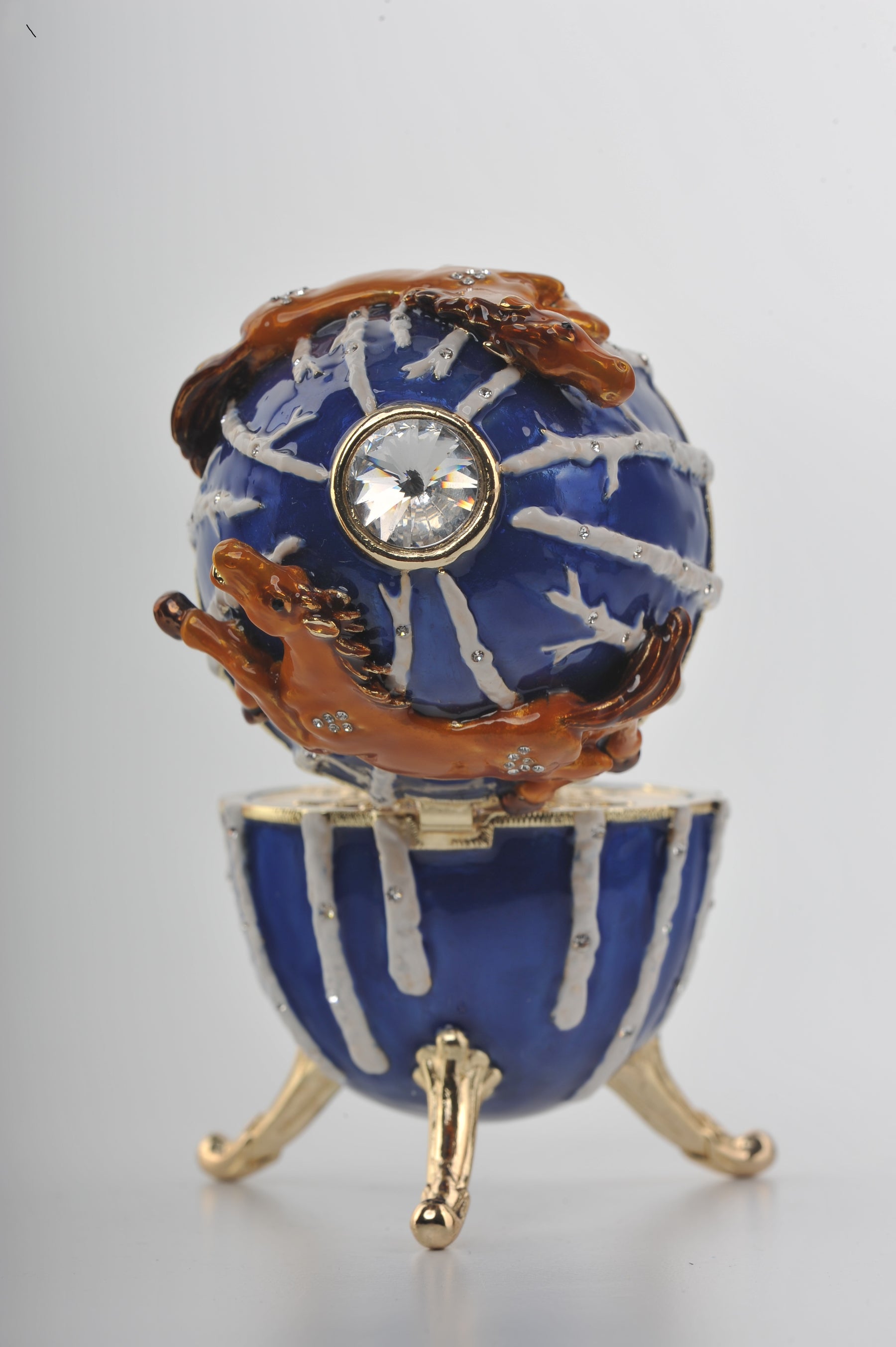 Boîte à bijoux en forme d'œuf de Fabergé bleue avec chevaux bruns