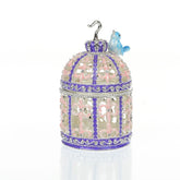 Light Blue Bird on top top of a purple birdcage Faberge Styled Trinket Box
