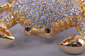 Golden Crab with blue stones