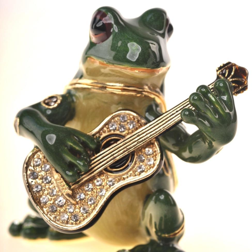 Gitarre spielender Frosch