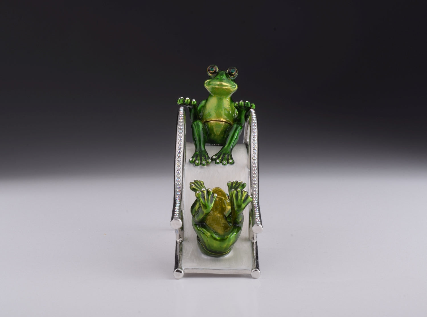 Two Frogs Riding Slide
