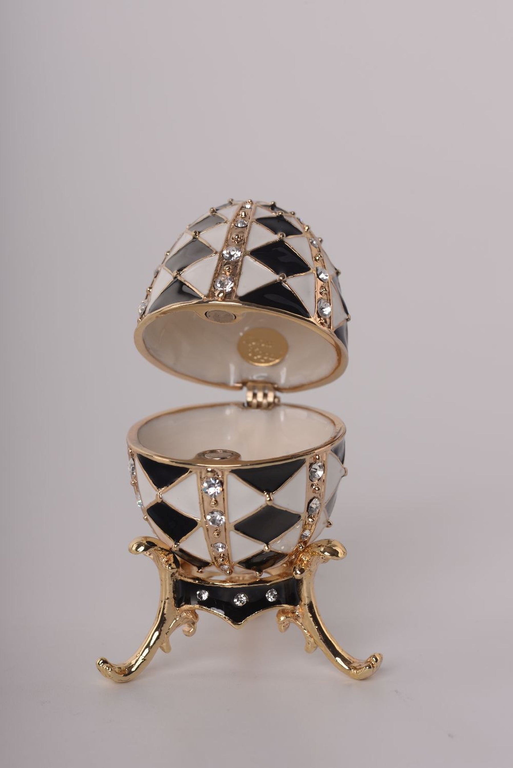 Black and White Faberge Egg with Gold Necklace Inside