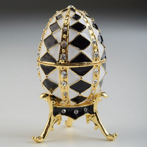 Black and White Faberge Egg with Gold Necklace Inside