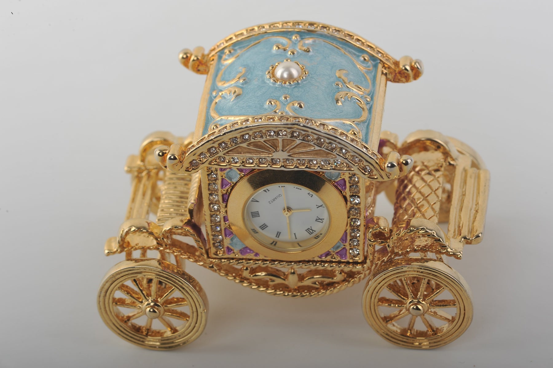 Keren Kopal Gold Carriage with a Clock  91.00