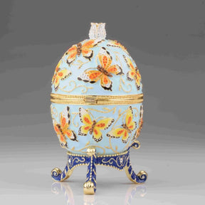 Blaues Fabergé-Ei mit gelben Blumen