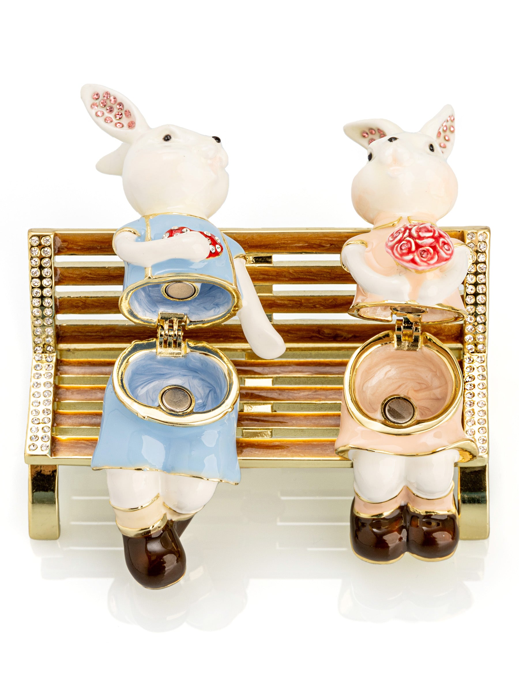 2 bunnies in love sitting on a bench, valentine flowers and chocolates