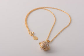 Keren Kopal Pink Pendant Necklace with an Apple Inside  37.00